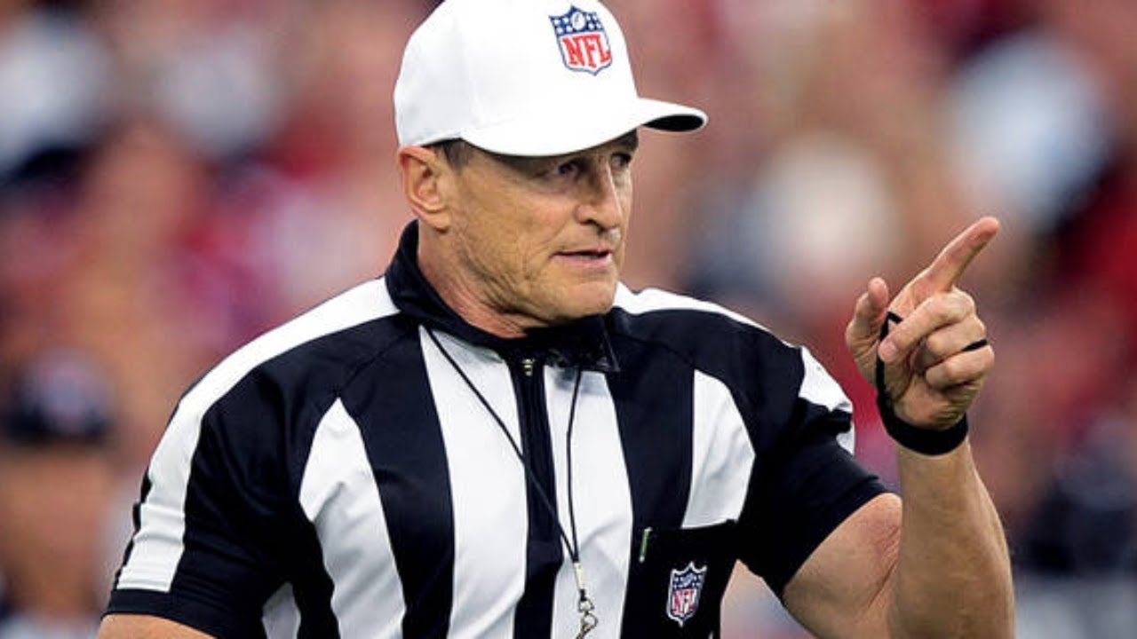 Officials Ed Hochuli and Jeff Triplette say goodbye to the NFL