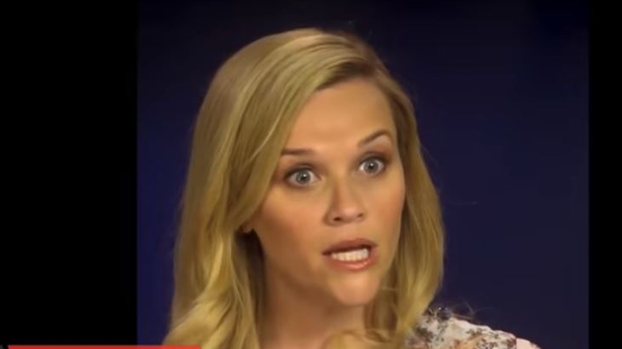 Journalist presents Reese Witherspoon with dissertation of 'Legally Blonde'
