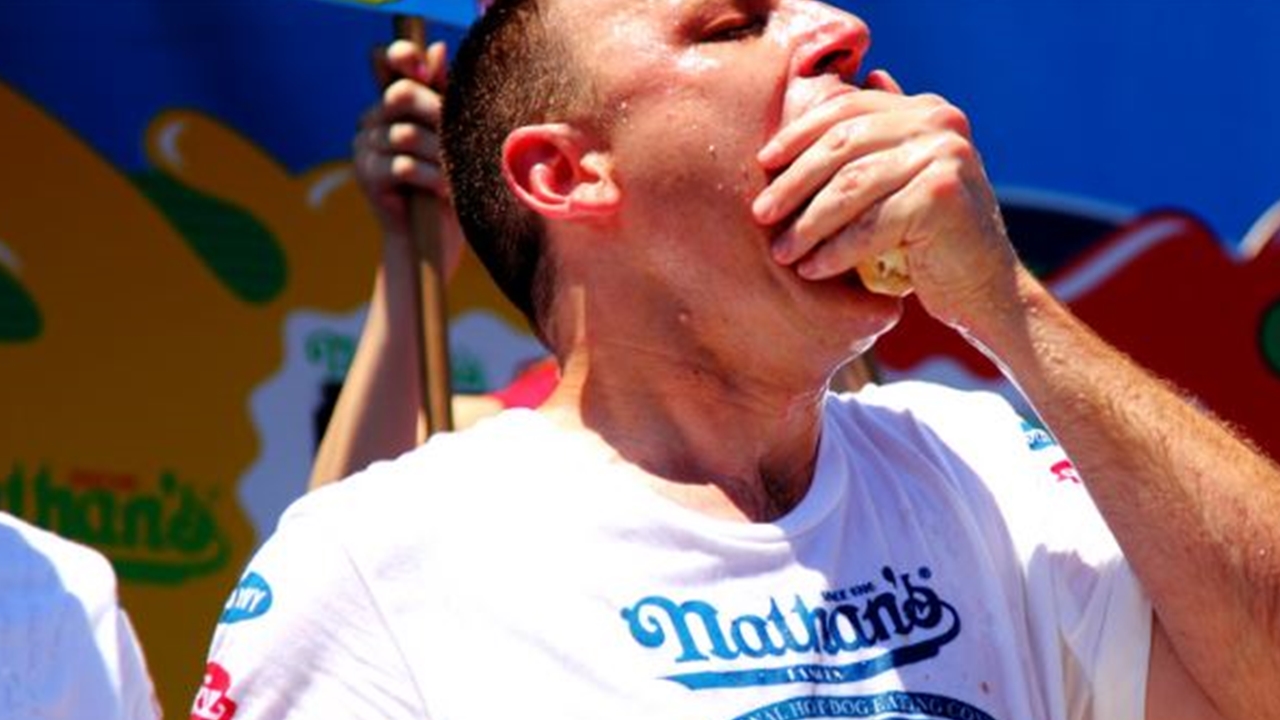 Joey Chestnut won Nathan’s Hot Dog Eating Contest; set 74-dog world record