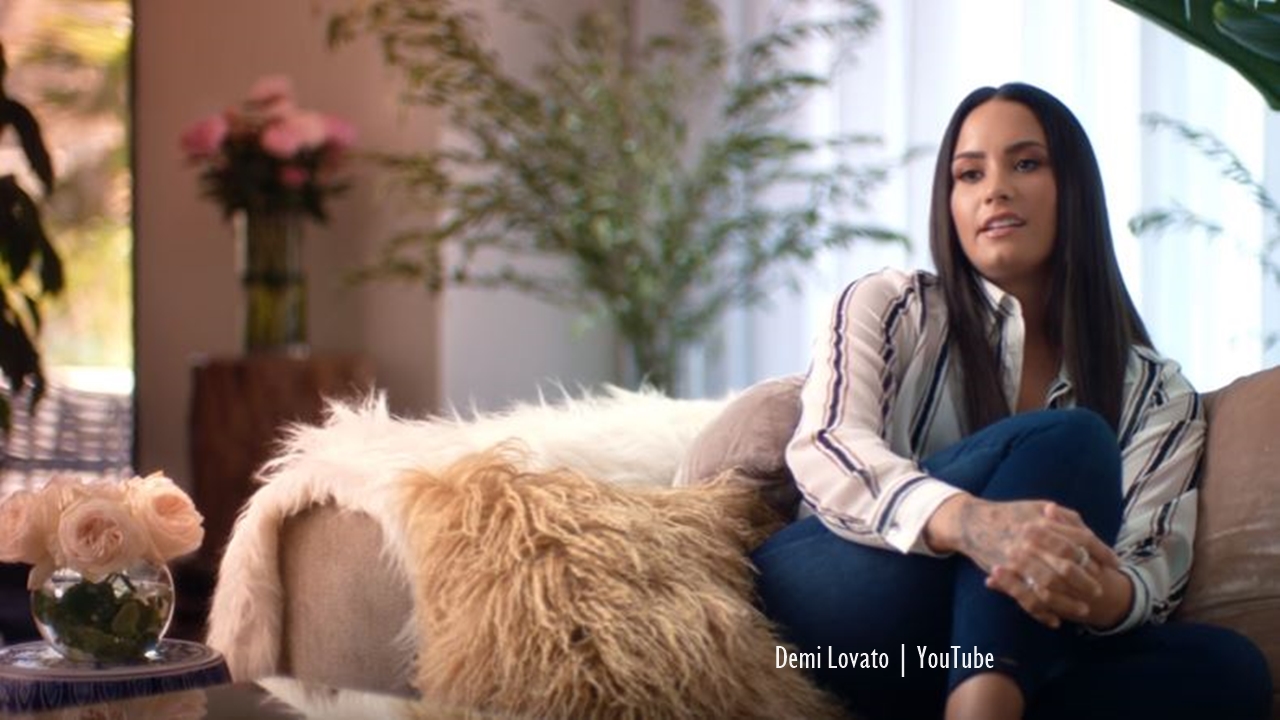 Demi Lovato 'awake' and with her family following reports of overdose