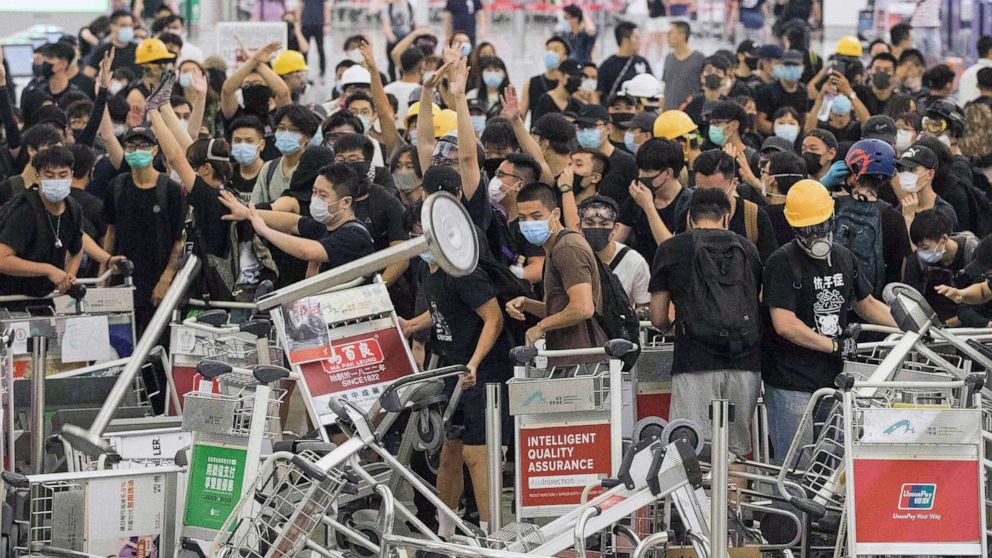 Hong Kong airport protest: Flights resume after second night of chaos
